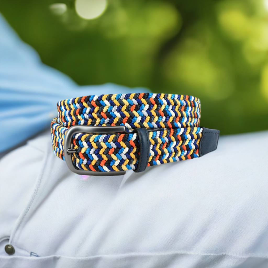 This Italian woven multi color belt is a must have in your collection. Stretch cotton, brushed buckle and leather trim. Made in the USA.