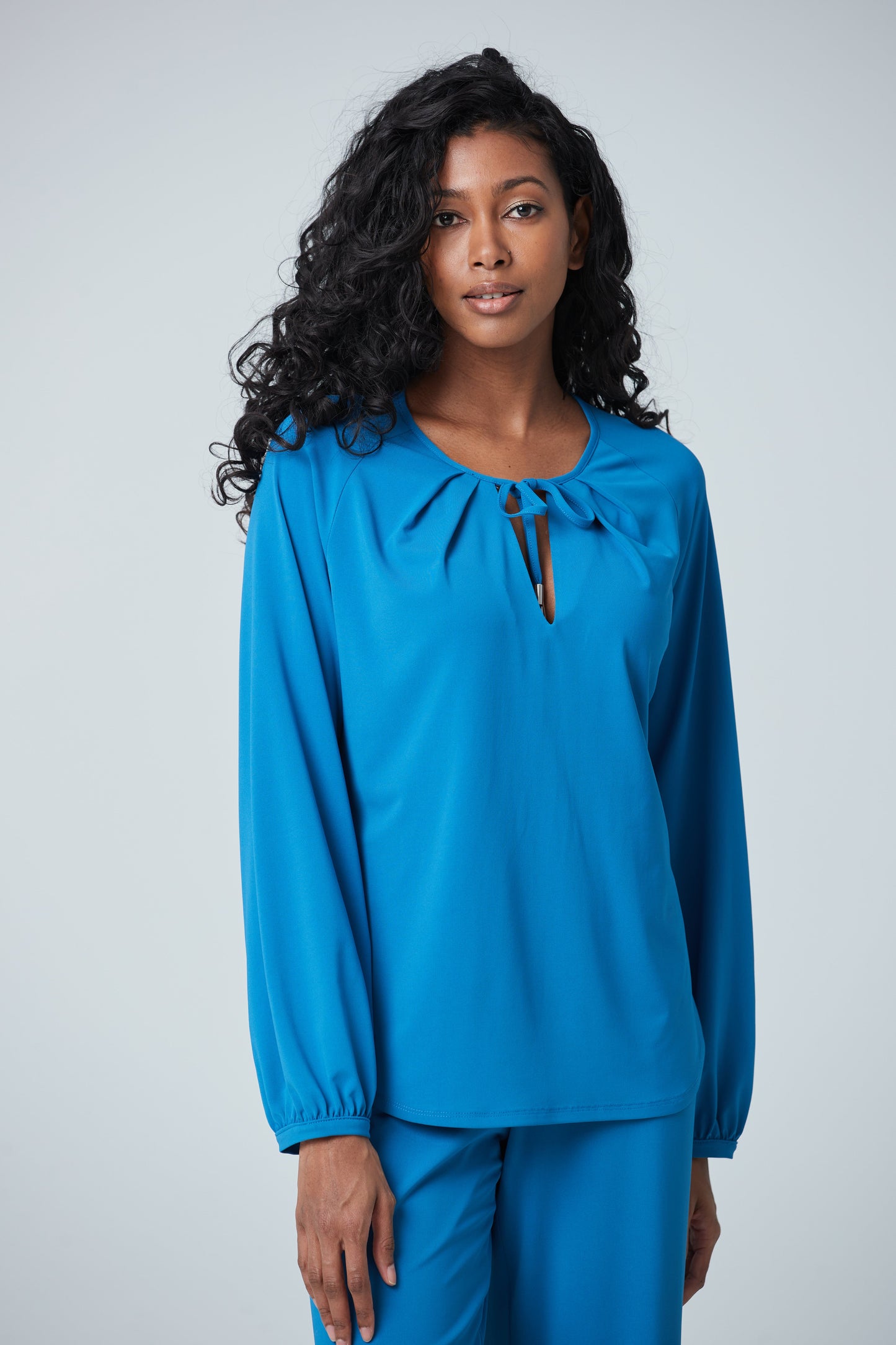 Top with billowy sleeves and key hole detail