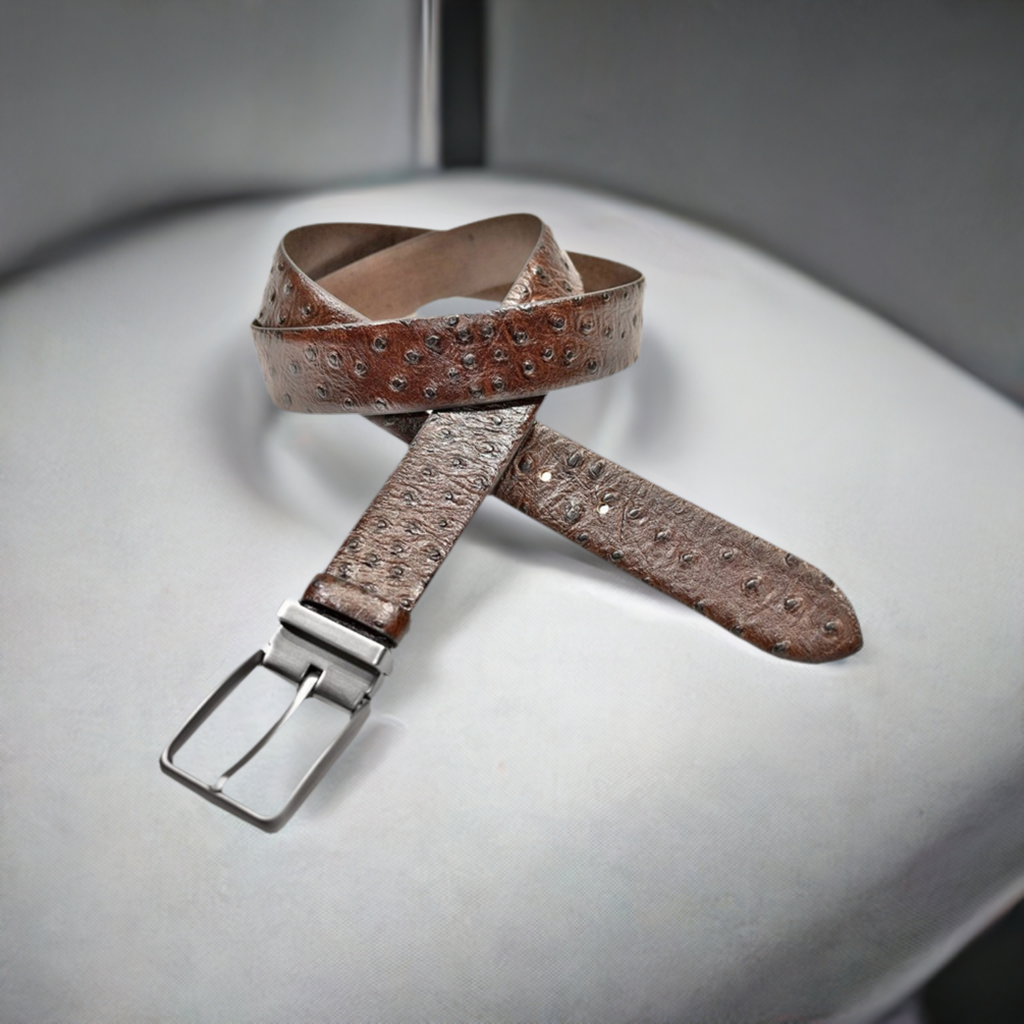 Bring elegance to your wardrobe with the Marcello Sport stamped ostrich leather belt. The intricate pattern and color shading elegantly elevate any look, while a satin nickel finished buckle adds a premium touch.