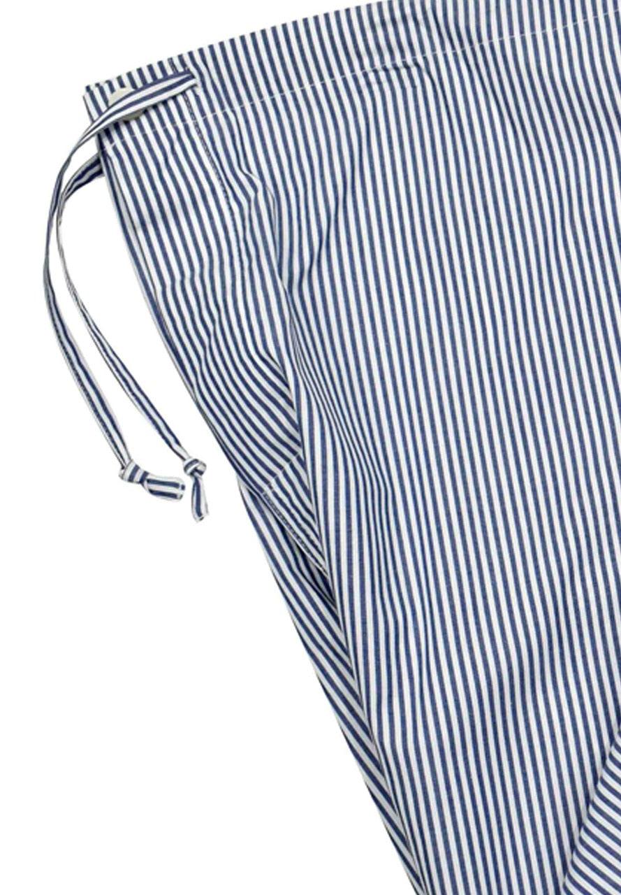 Classic navy blue stripe on soft cotton fabric. Long sleeve top with a chest pocket, draw string pant with open leg. Classic fit.  Croix Comfort Pajamas  100% cotton machine washable. Accent white edge piping. Classic style is always easy and in fashion. Draw string pant for a relaxed feel. Shirt top with classic chest pocket.