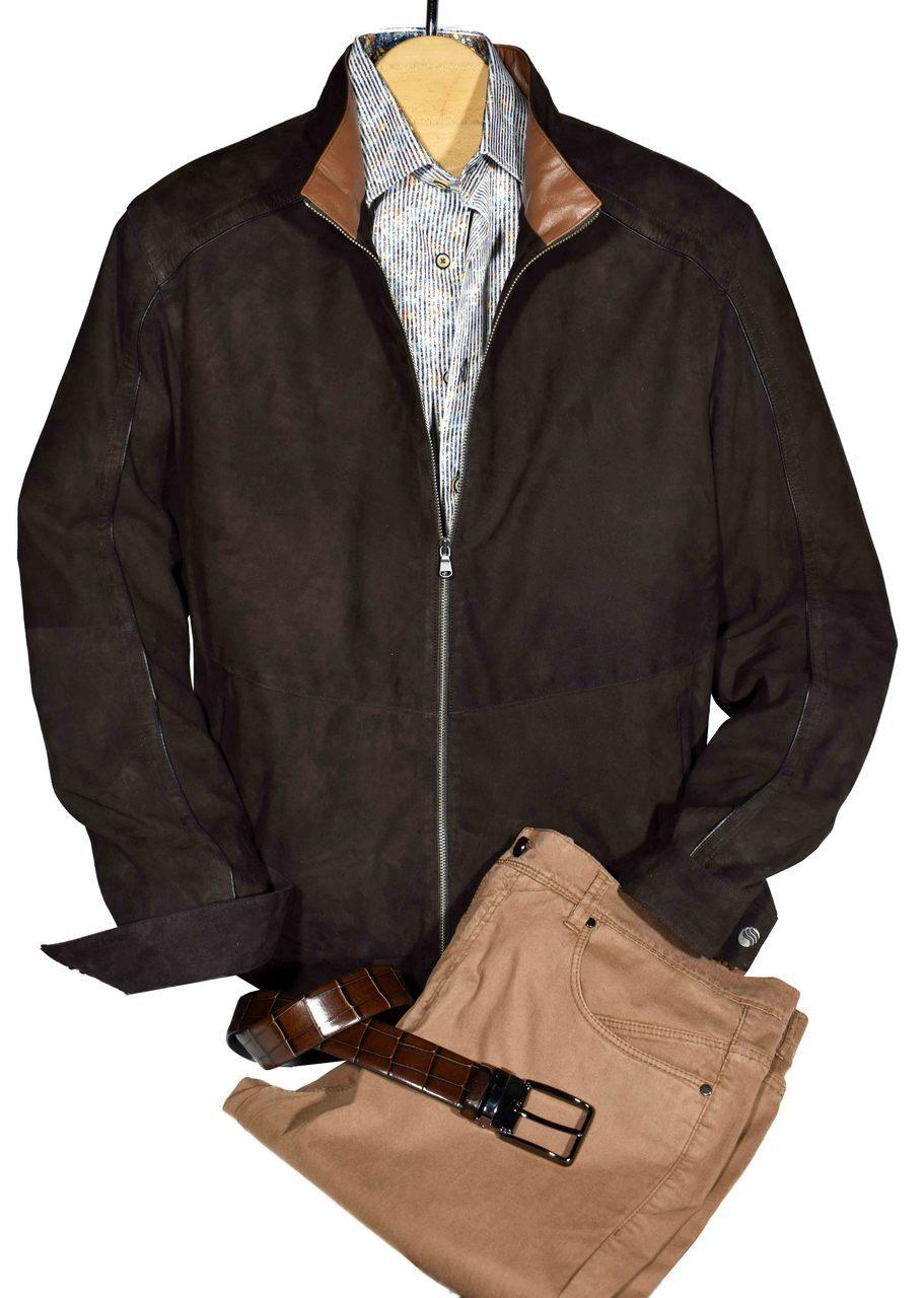 A great jacket becomes a favorite go to item and this suede bomber is ready. With a leather lined stand up collar, fine leather shoulder and sleeve trim, this classic looks the part. Soft poly lined, classic pockets, friendly adjustable cuffs and a stretch waist band for comfort. Genuine suede. By Marcello Sport.